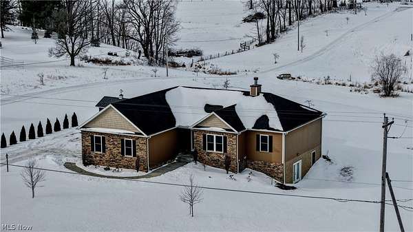 1.56 Acres of Residential Land with Home for Sale in Orrville, Ohio