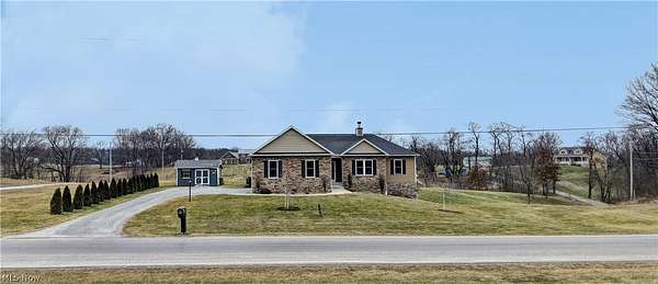 1.56 Acres of Land with Home for Sale in Orrville, Ohio