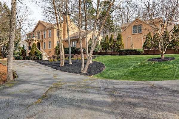 2.56 Acres of Residential Land with Home for Sale in Roswell, Georgia