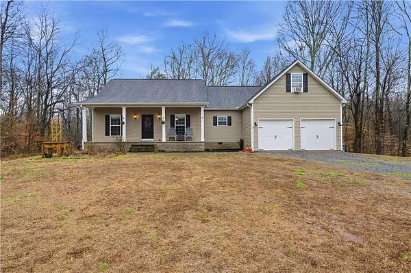 14.3 Acres of Land with Home for Sale in Resaca, Georgia
