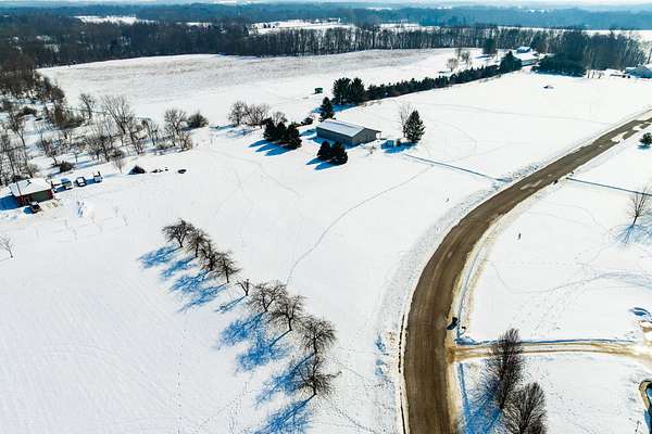 1.38 Acres of Residential Land for Sale in Eau Claire, Michigan