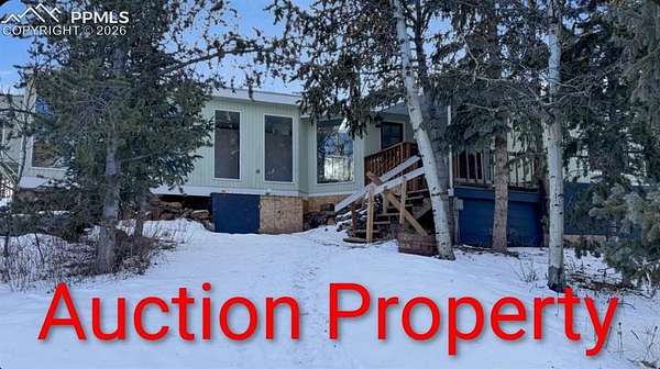 2.28 Acres of Land with Home for Auction in Divide, Colorado