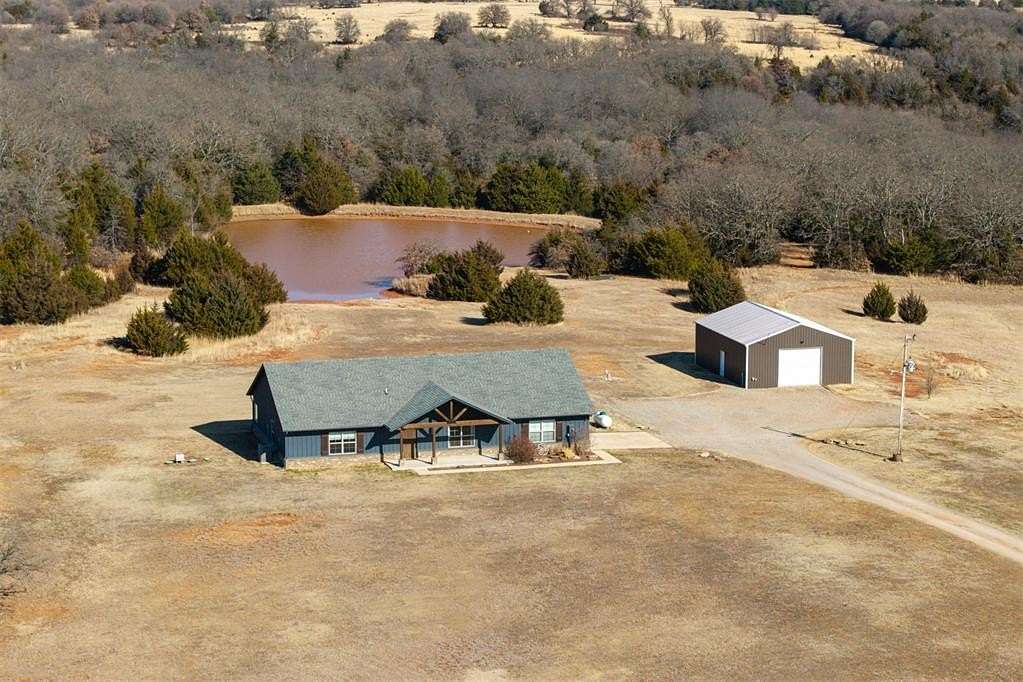 68 Acres of Recreational Land with Home for Sale in Wellston, Oklahoma
