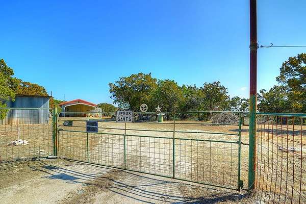 10.9 Acres of Land with Home for Sale in Center Point, Texas