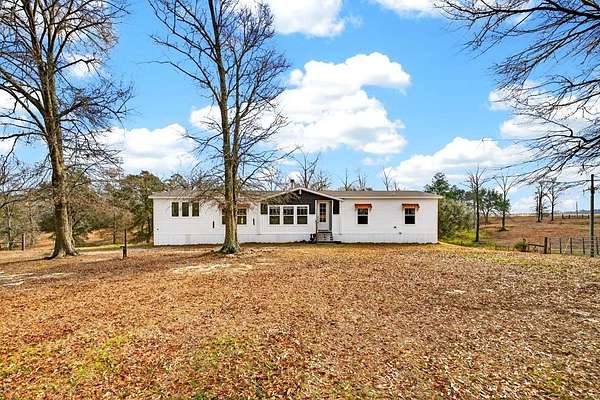 15.9 Acres of Land with Home for Sale in Lumberton, Mississippi