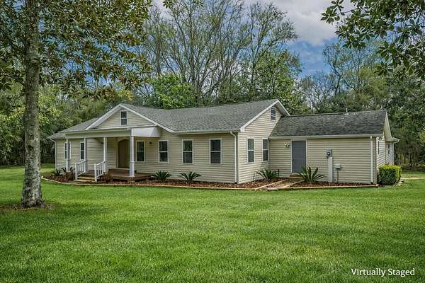 2.4 Acres of Residential Land with Home for Sale in Crawfordville, Florida