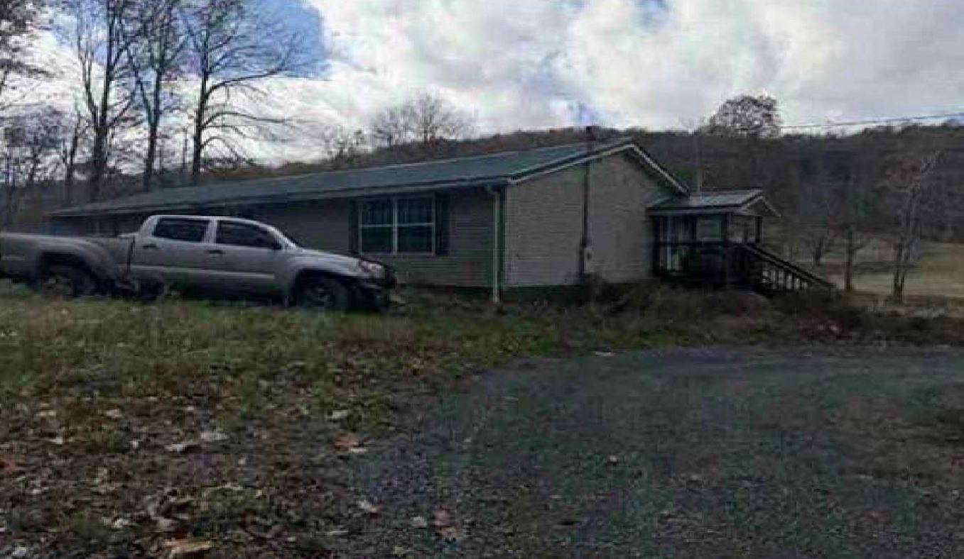 1.86 Acres of Land with Home for Auction in Rowlesburg, West Virginia
