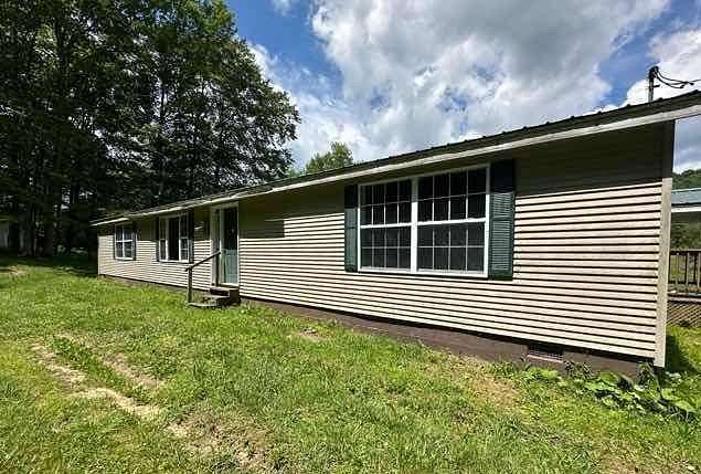1.86 Acres of Land with Home for Auction in Rowlesburg, West Virginia