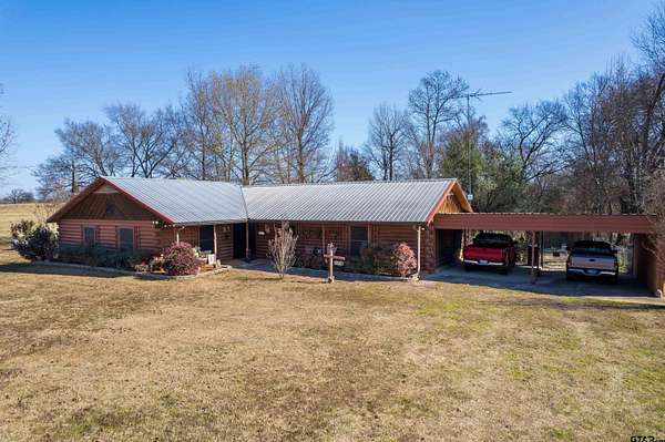 2 Acres of Land with Home for Sale in Scroggins, Texas