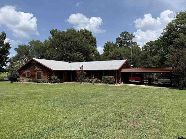 2 Acres of Land with Home for Sale in Scroggins, Texas
