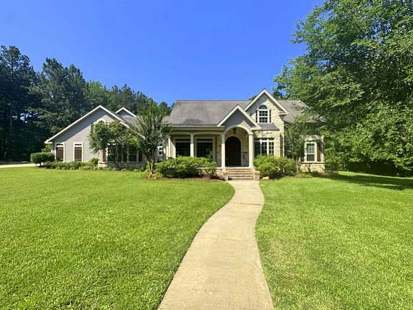 5.8 Acres of Land with Home for Sale in Magnolia, Arkansas