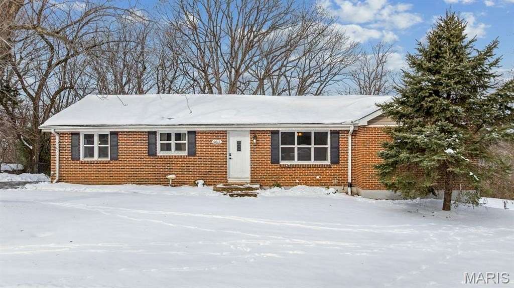 1.69 Acres of Residential Land with Home for Sale in High Ridge, Missouri