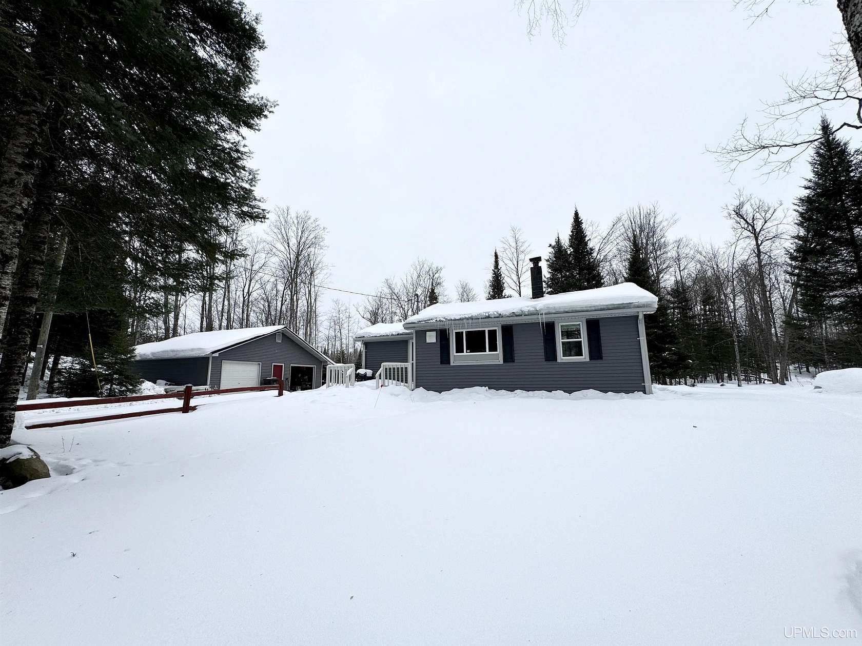 40 Acres of Recreational Land with Home for Sale in Rapid River, Michigan