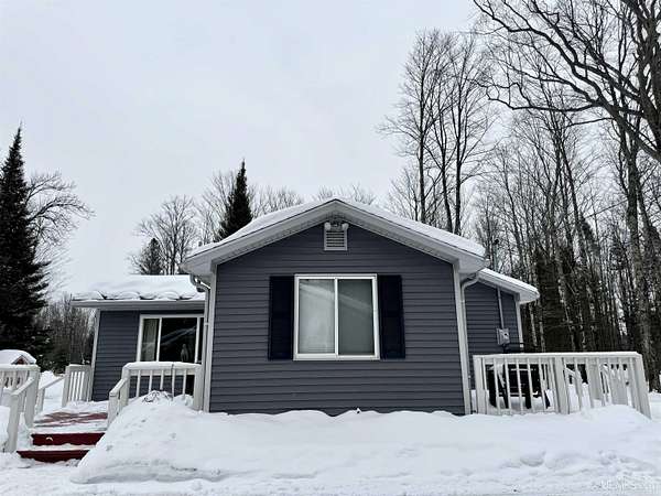 89 Acres of Recreational Land with Home for Sale in Rapid River, Michigan