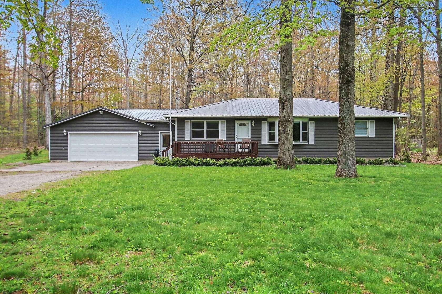 5 Acres of Land with Home for Sale in Spring Lake, Michigan