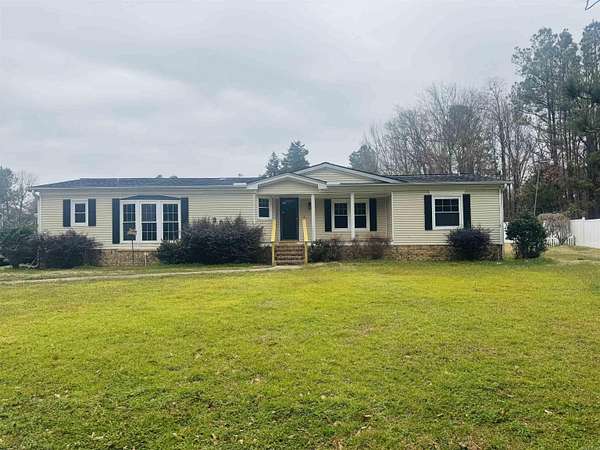 13.2 Acres of Land with Home for Sale in Camden, Arkansas