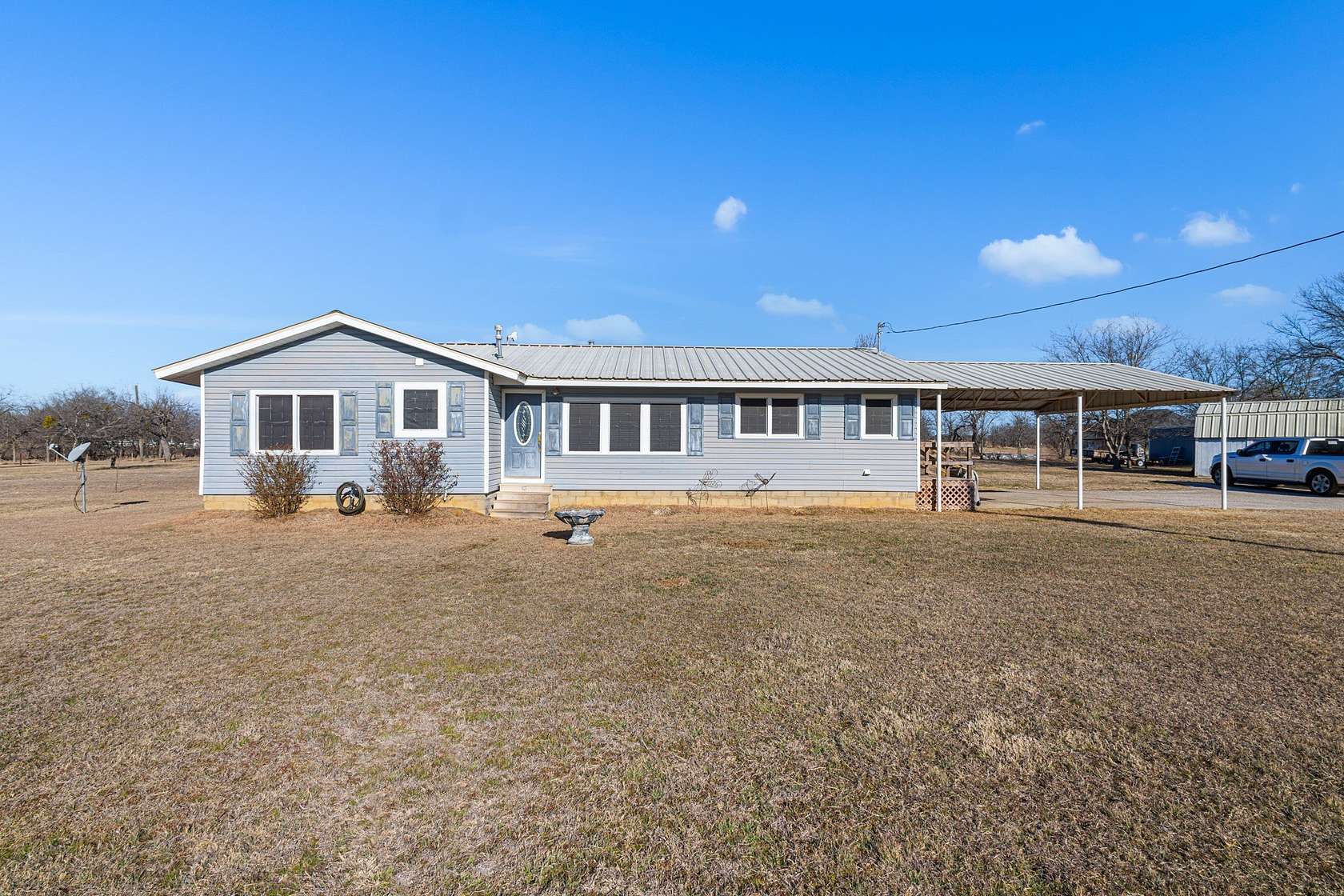 1.66 Acres of Land with Home for Sale in Runaway Bay, Texas