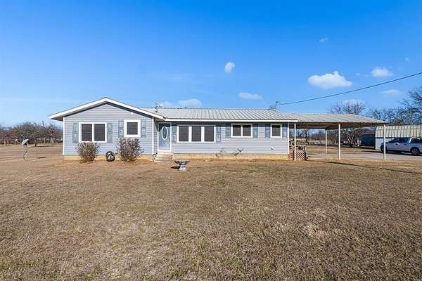 1.66 Acres of Residential Land with Home for Sale in Runaway Bay, Texas