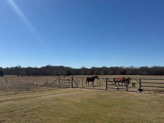 33 Acres of Land with Home for Sale in Wolfe City, Texas