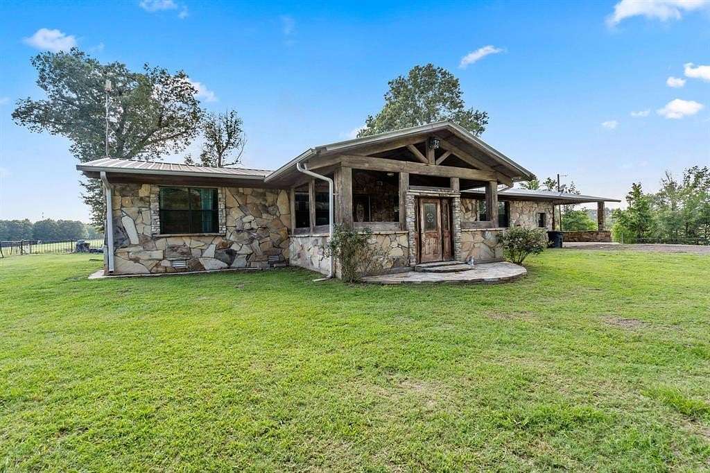 31.2 Acres of Agricultural Land with Home for Sale in Hughes Springs, Texas