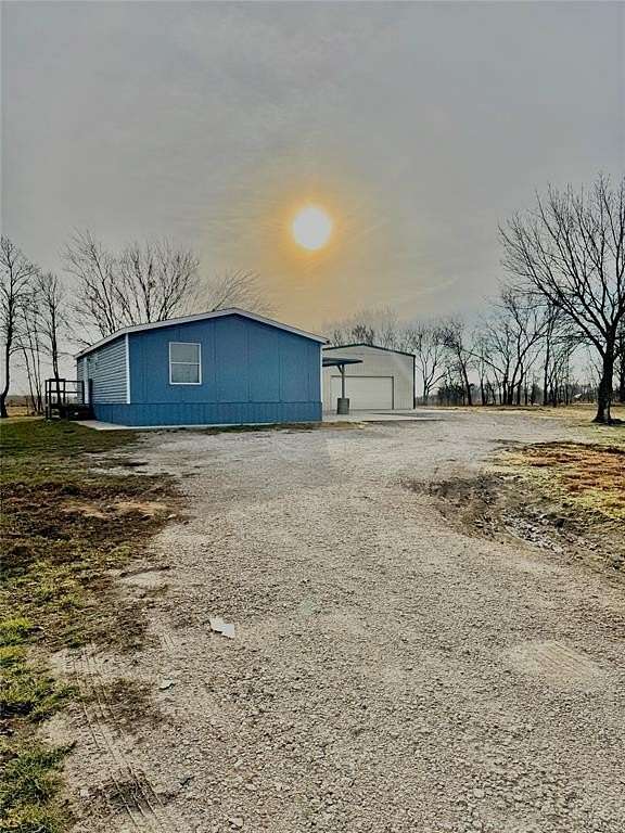 1.84 Acres of Residential Land with Home for Sale in Quinlan, Texas