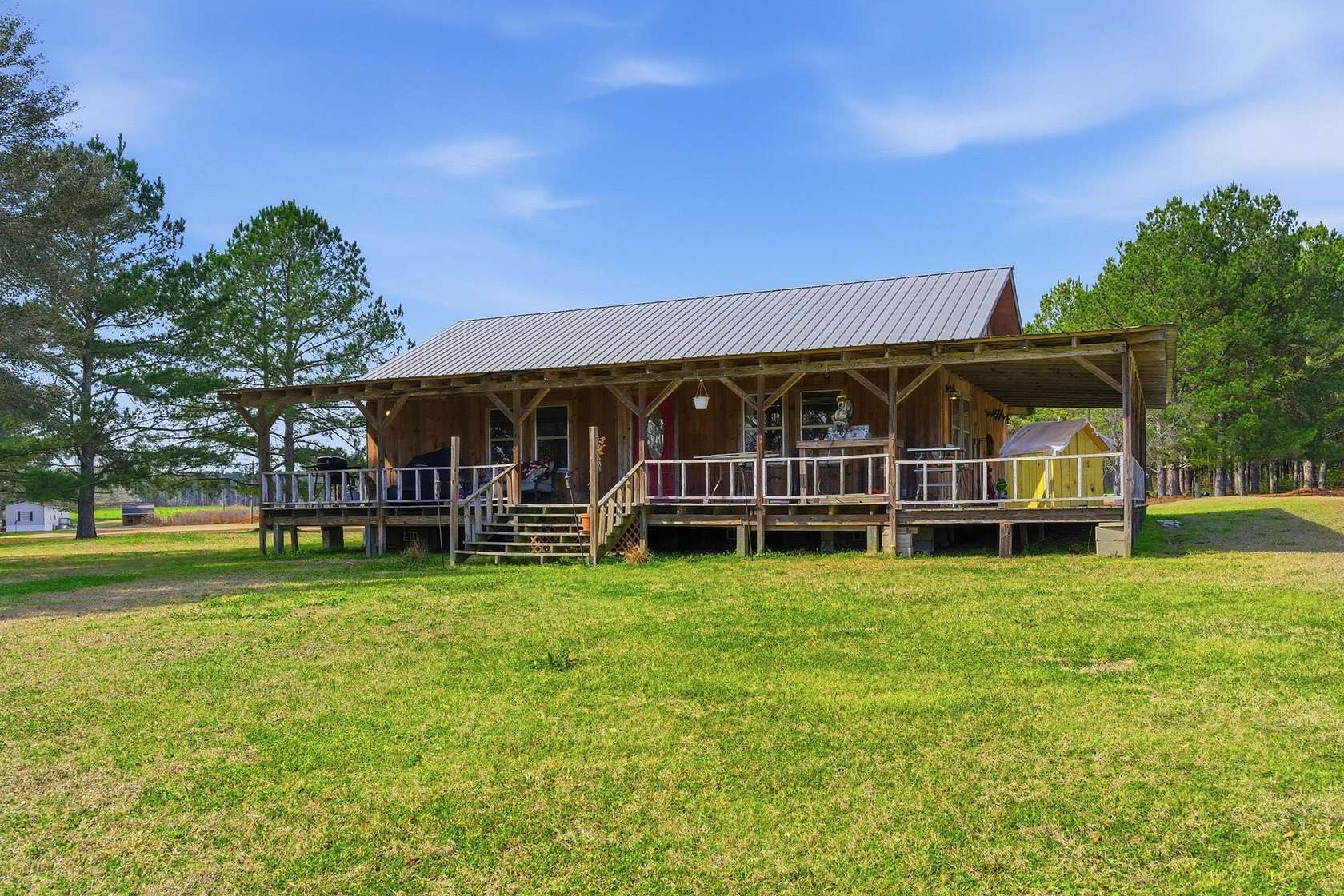 1.29 Acres of Residential Land with Home for Sale in Sumrall, Mississippi