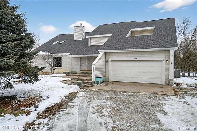 2.5 Acres of Residential Land with Home for Sale in Grand Ledge, Michigan