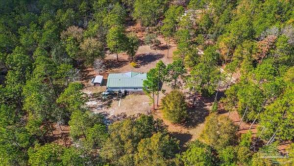 3.58 Acres of Residential Land with Home for Sale in Holt, Florida