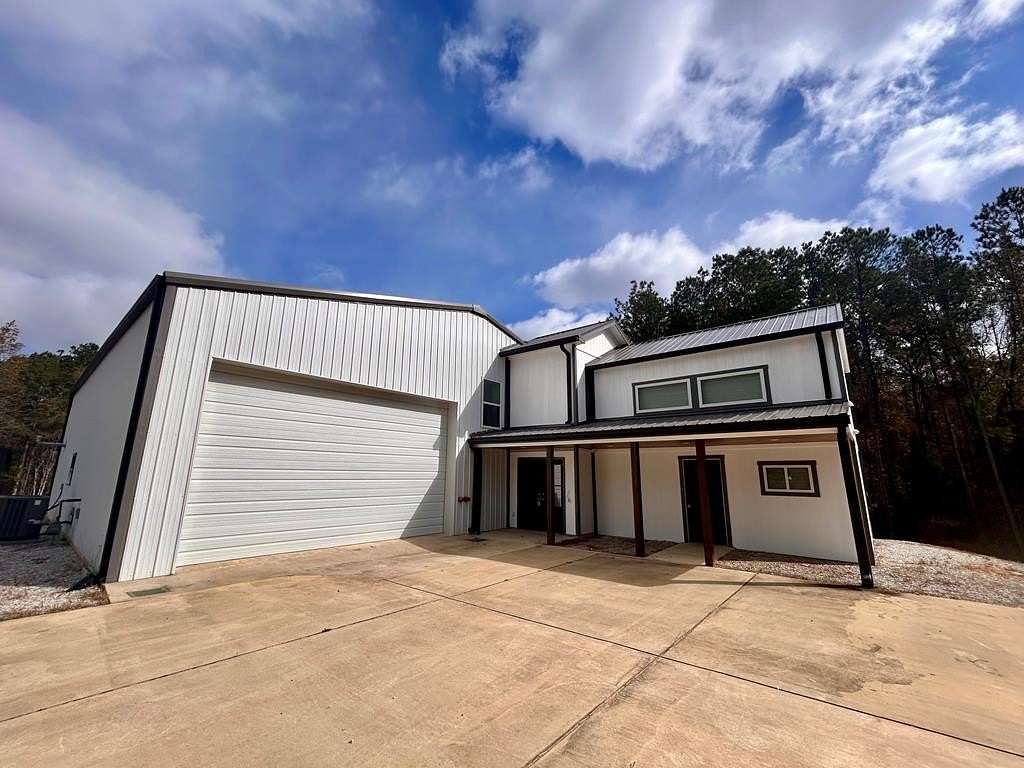 6.43 Acres of Land with Home for Sale in Guntown, Mississippi