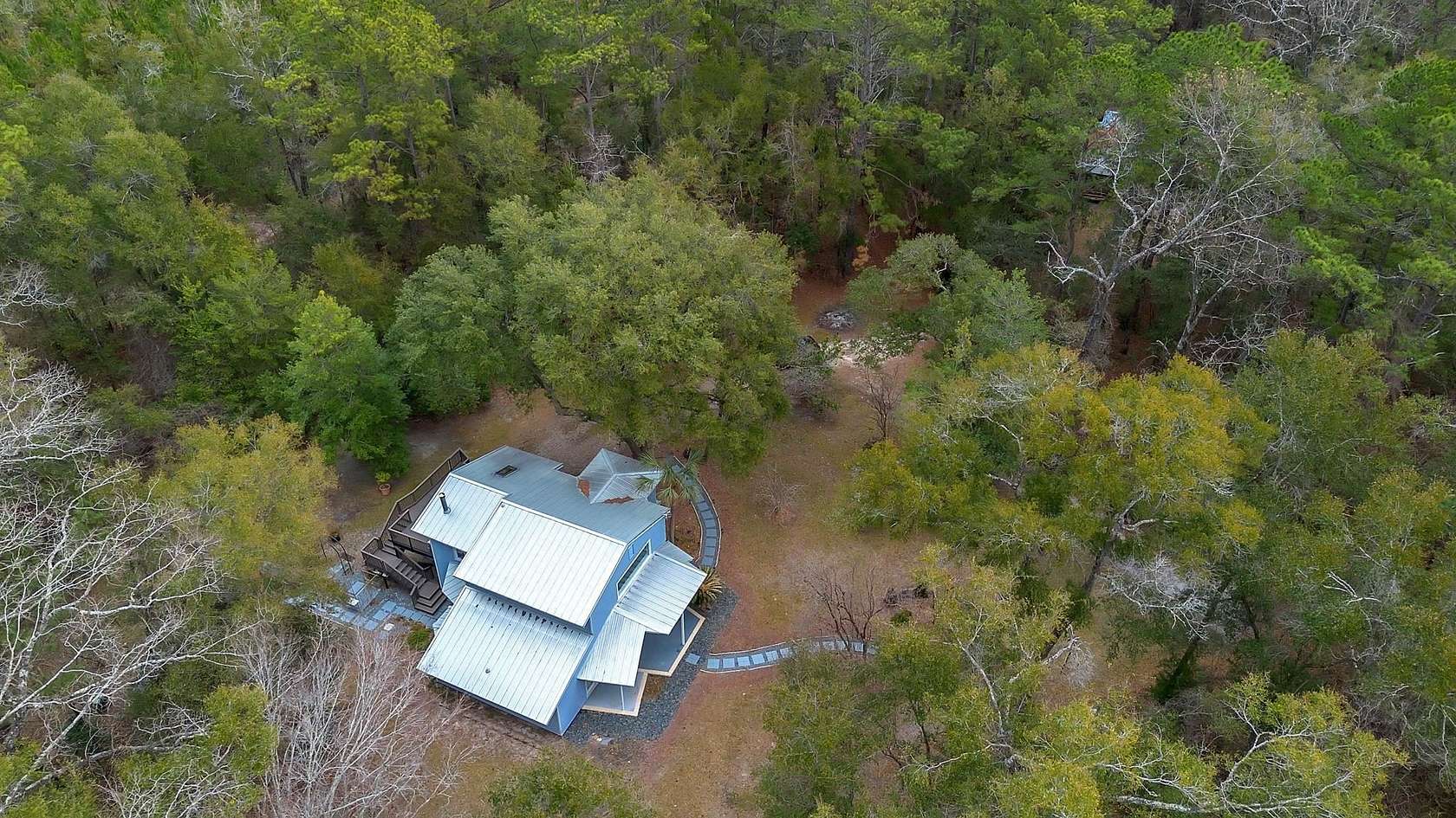 6.4 Acres of Land with Home for Sale in Crawfordville, Florida