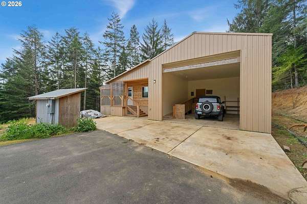 2.12 Acres of Residential Land with Home for Sale in North Bend, Oregon