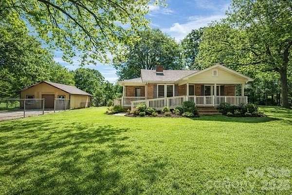 12.8 Acres of Land with Home for Sale in Dallas, North Carolina