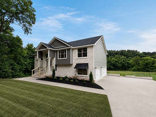 3.13 Acres of Land with Home for Sale in Cunningham, Tennessee