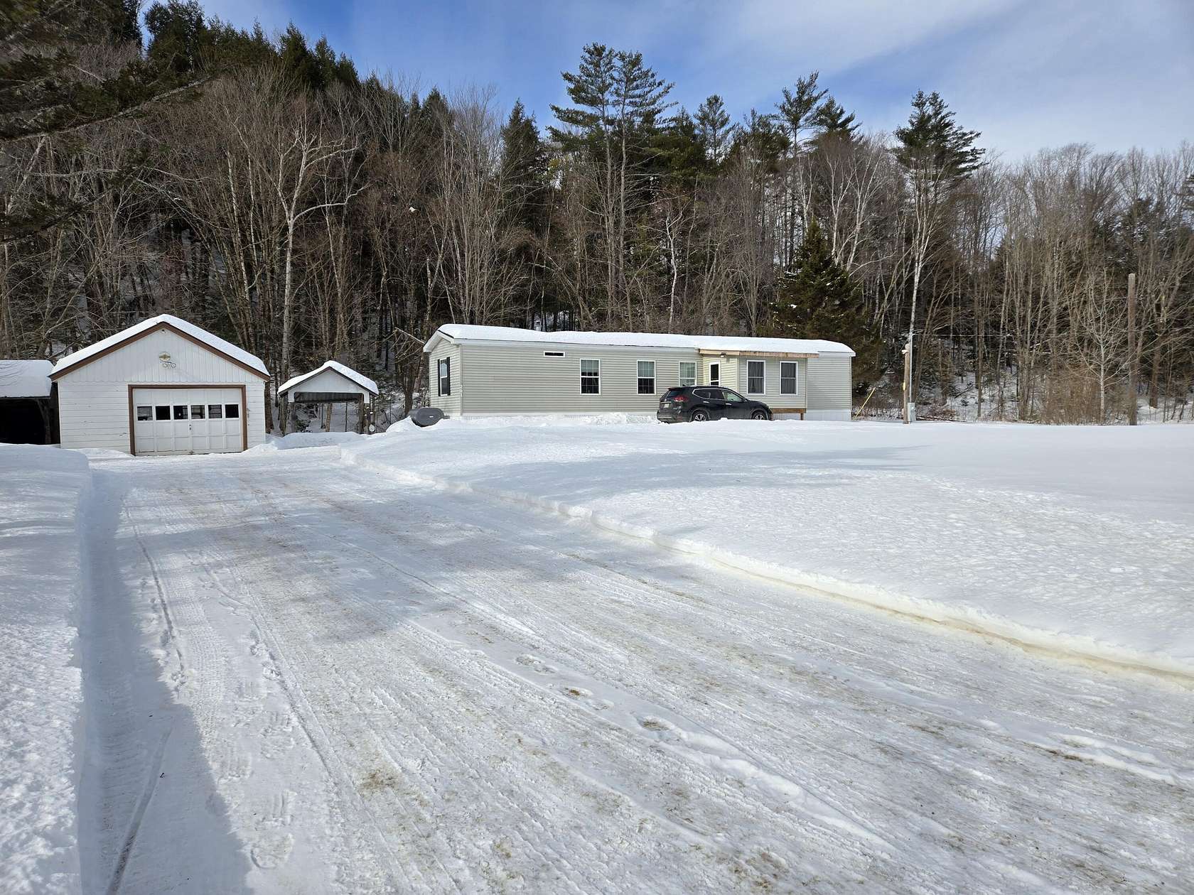 23.3 Acres of Recreational Land with Home for Sale in Mexico, Maine