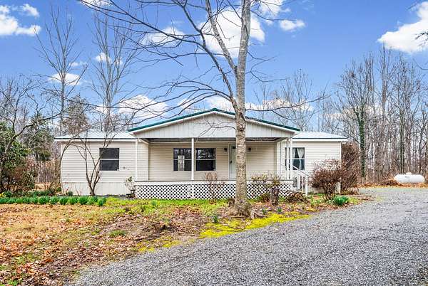 5.75 Acres of Land with Home for Sale in Cadiz, Kentucky