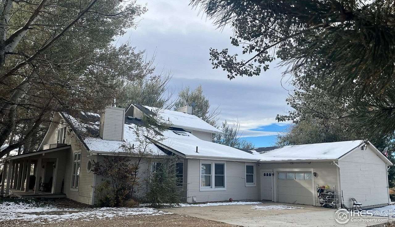 4.69 Acres of Residential Land with Home for Sale in Longmont, Colorado