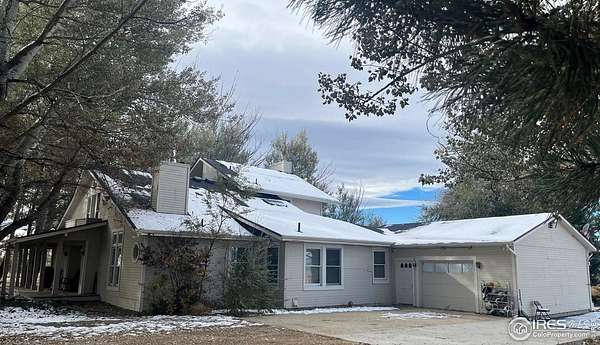 4.69 Acres of Residential Land with Home for Sale in Longmont, Colorado