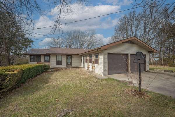 25.7 Acres of Recreational Land with Home for Sale in Cassville, Missouri