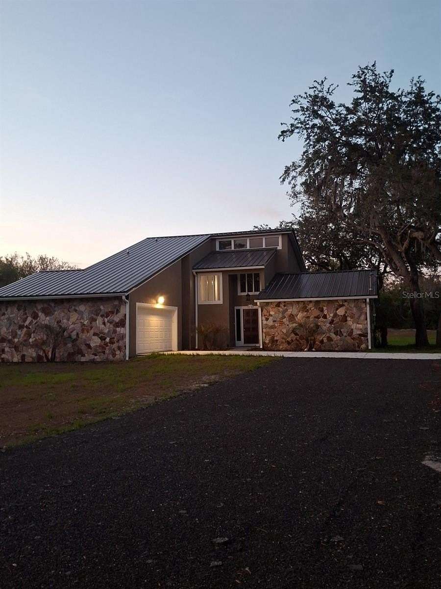 2.5 Acres of Land with Home for Sale in Osteen, Florida
