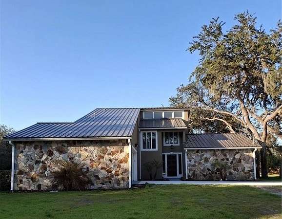 2.5 Acres of Land with Home for Sale in Osteen, Florida