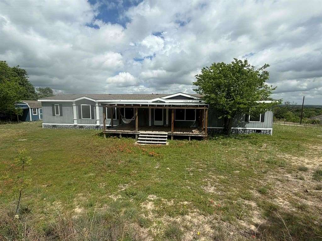 5 Acres of Land with Home for Sale in Springtown, Texas