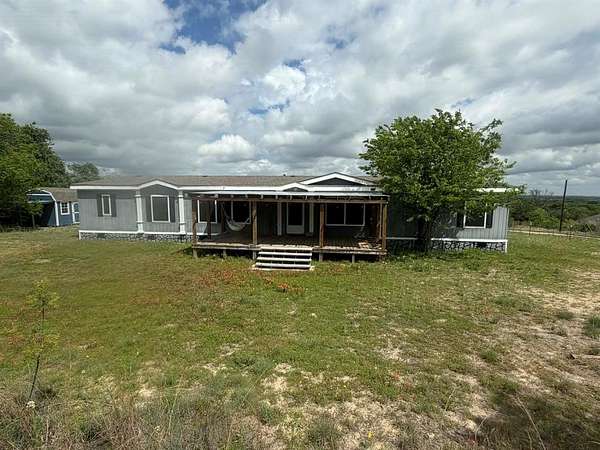 5 Acres of Land with Home for Sale in Springtown, Texas