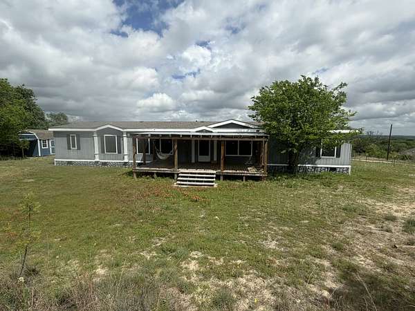 5 Acres of Land with Home for Sale in Springtown, Texas