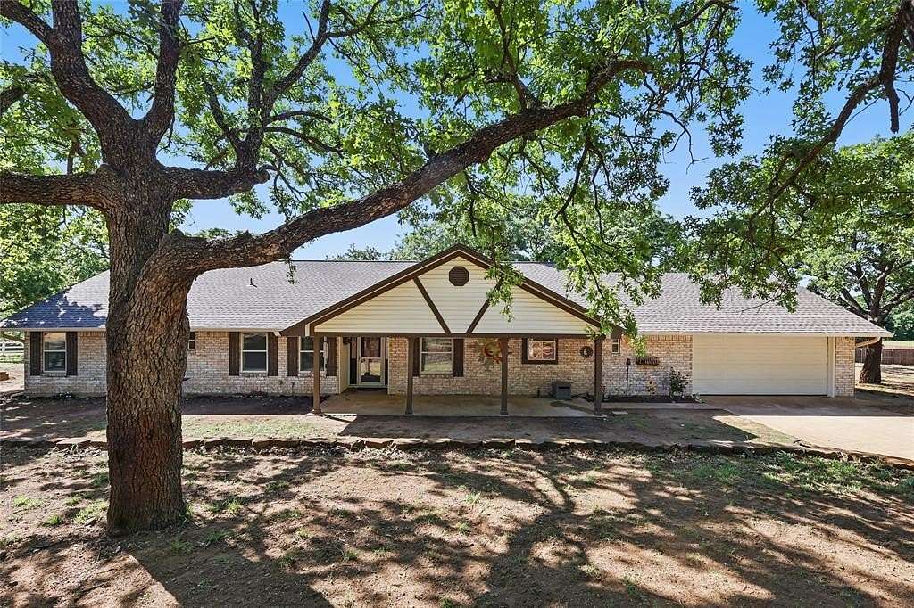 2.47 Acres of Residential Land with Home for Sale in Corinth, Texas