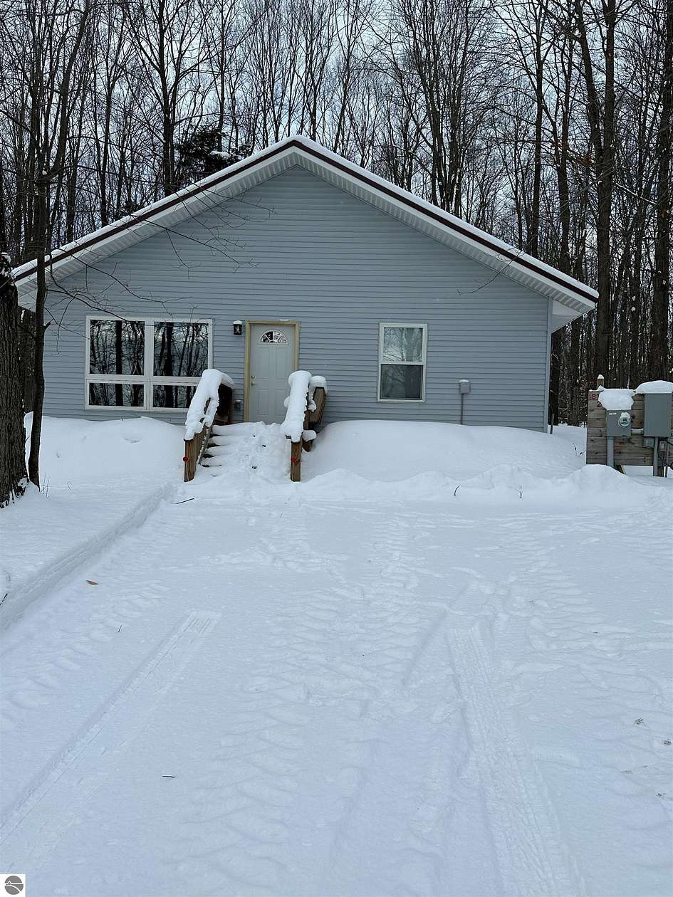 5 Acres of Residential Land with Home for Sale in South Boardman, Michigan