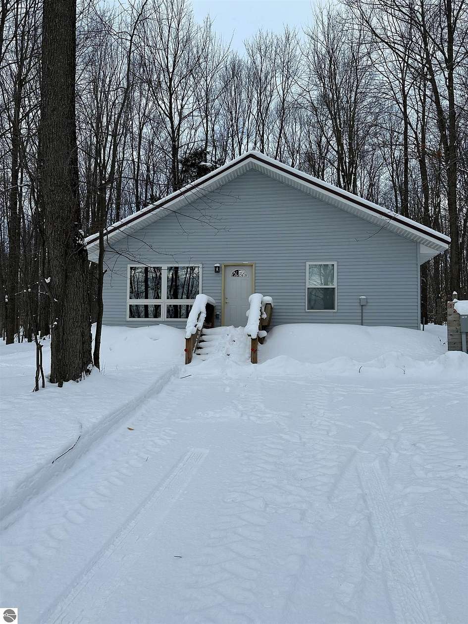 5 Acres of Land with Home for Sale in South Boardman, Michigan