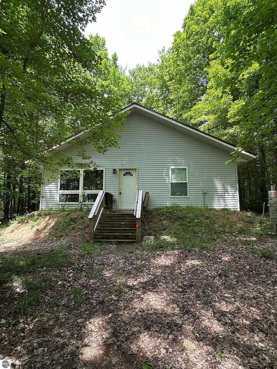 5 Acres of Land with Home for Sale in South Boardman, Michigan