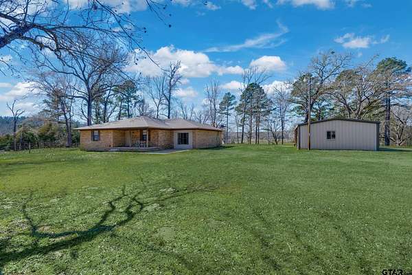 16.1 Acres of Land with Home for Sale in Palestine, Texas