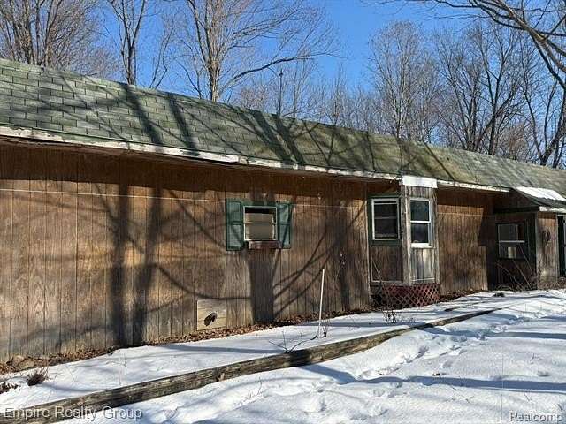 2 Acres of Land with Home for Sale in Bunker Hill Township, Michigan
