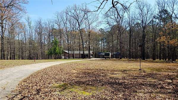 5.45 Acres of Land with Home for Sale in Mount Ida, Arkansas